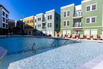 Outdoor resort style pool at the merchant apartments in charleston, sc 29403